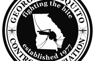 Georgia Mosquito Control Association logo featuring a mosquito silhouette inside a circular black‑and‑white seal with the text ‘Georgia Mosquito Control Association’ and ‘Established 1979.’